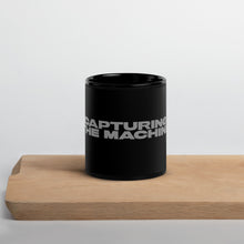 Load image into Gallery viewer, Capturing the machine black mug front view