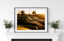 Load image into Gallery viewer, Framed image on white wall of rained on Porsches at Luftgekühlt
