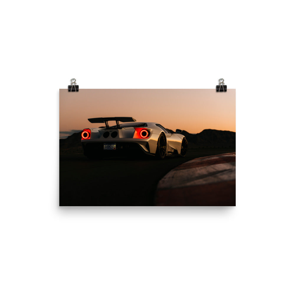 Frozen white Ford GT rear quarter view at sunset