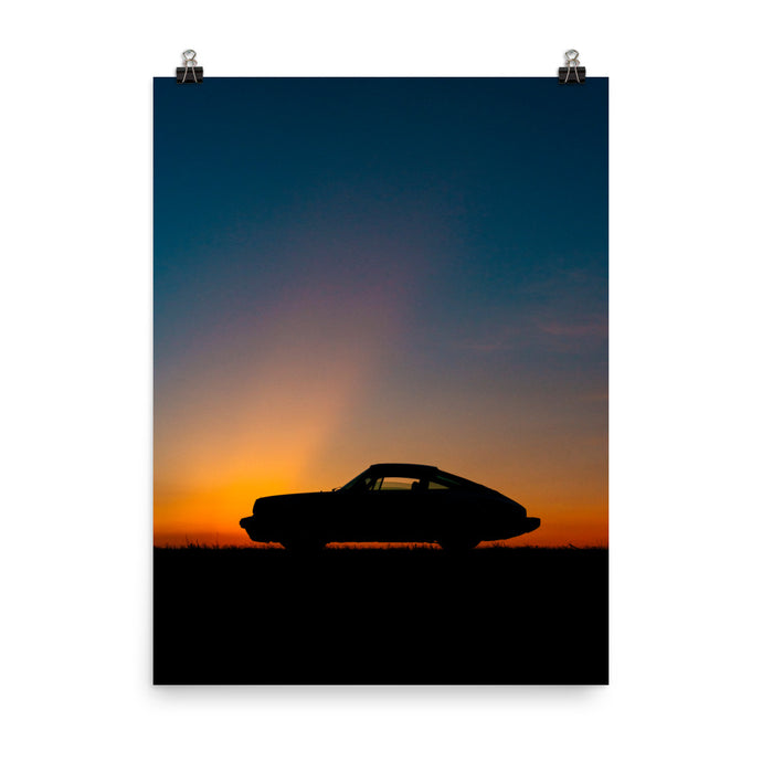 Vintage Porsche 911 side profile silhouette at sunset
