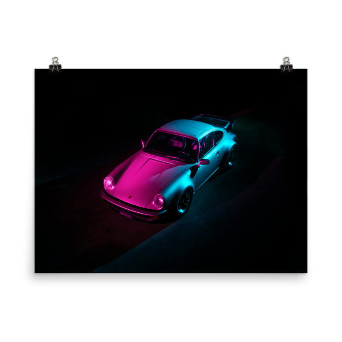 Porsche 911 Turbo lit in pink and cyan from above
