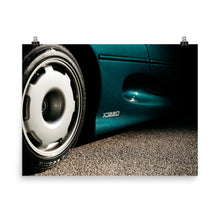 Load image into Gallery viewer, Wheel and logo detail on Green Jaguar XJ220
