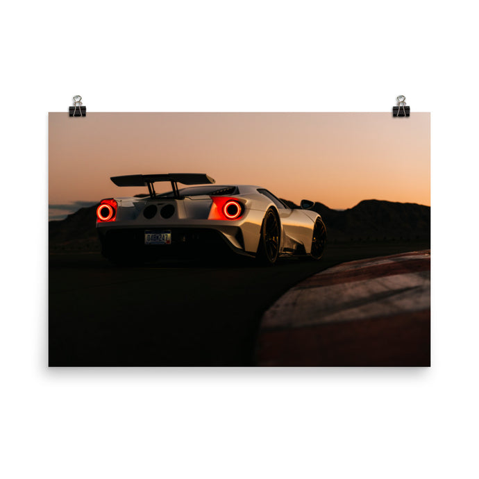 Frozen white Ford GT rear quarter view at sunset