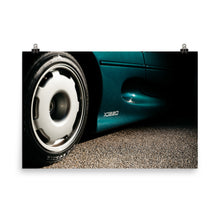 Load image into Gallery viewer, Wheel and logo detail on Green Jaguar XJ220
